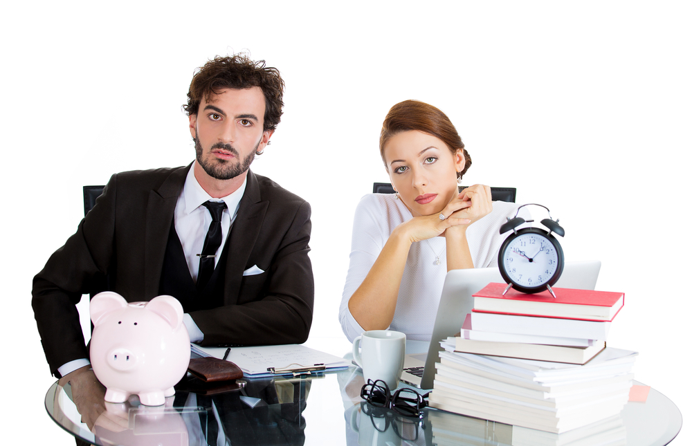 Closeup portrait of young couple, sad man, unhappy woman, looking distressed from financial problems, mounting bills, isolated on white background. Bad finance decision, bankruptcy. Bank mistake